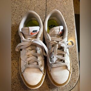 Nike Kids White Sneakers with Orange Swoosh